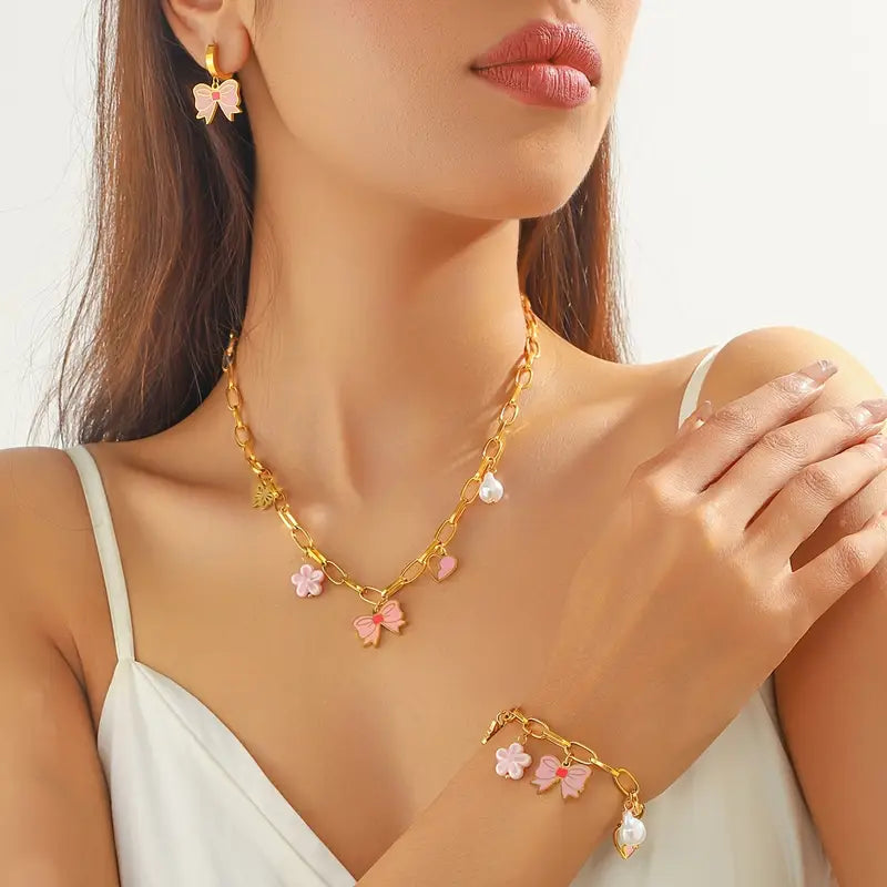 Golden Grace: Bow Pendant Necklace with Heart and Flower Charms